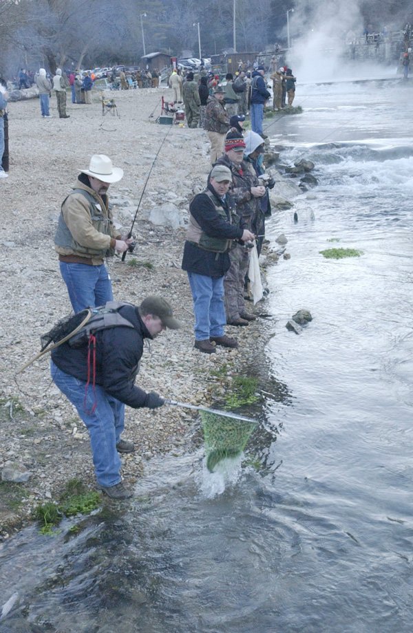 Opening day at Roaring River State Park draws crowds of trout anglers. The catch and keep fishing season starts at 6:30 a.m. Friday. 