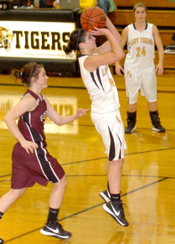 Lacey Beeks, Prairie Grove junior, pulls up to take a jumper Feb. 1 against Gentry. Beeks scored 19 points in the Lady Tigers’ victory. 