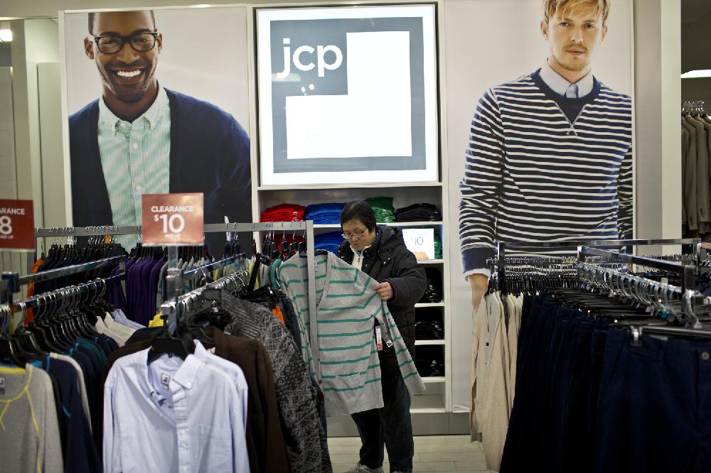 A customer shops for clothing at a J.C. Penney Co. store in the Queens borough of New York, U.S., on Tuesday, Feb. 26, 2013. Confidence among U.S. consumers jumped more than forecast in February as Americans adjusted to a higher payroll tax and signs of a recovering housing market spurred faith in the future. J.C. Penney Co. is scheduled to release earnings data on Feb. 27. Photographer: Victor J. Blue/Bloomberg