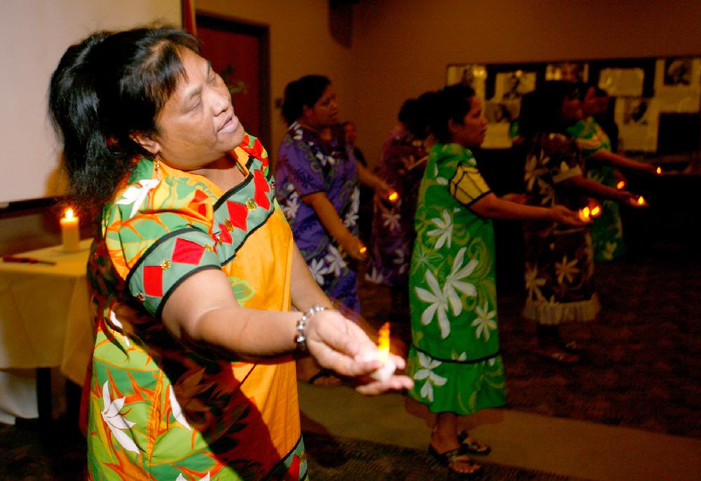 STAFF PHOTO JASON IVESTER
Likey (cq) Peter participates in a candelight dance during a ceremony on Thursday, Feb. 28, 2013, at NorthWest Arkansas Community College in Bentonville for the remembrance of the victims and survivors of the Marshall Islands nuclear test.