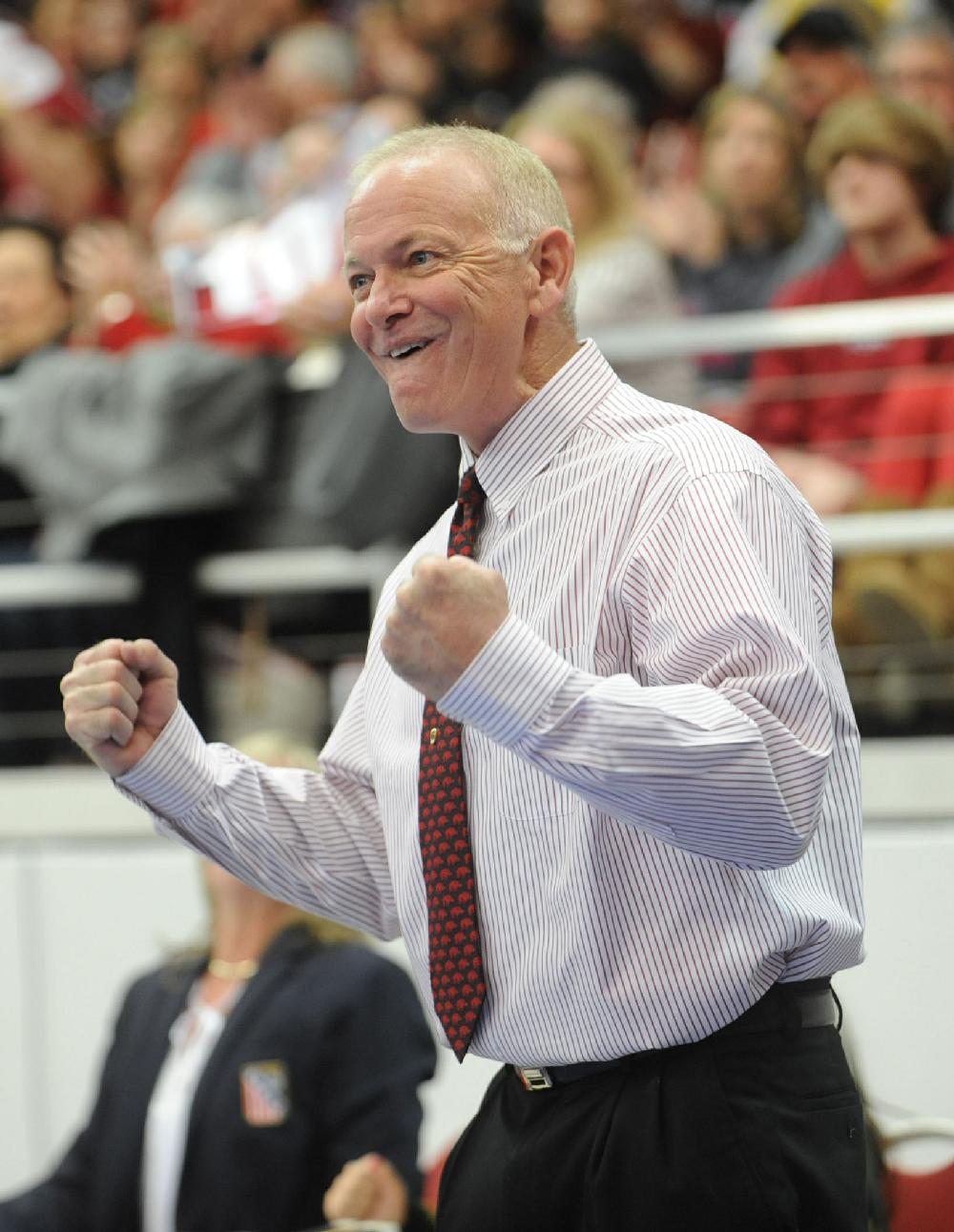 NWA Media/ANDY SHUPE
Arkansas co-head coach Mark Cook celebrates a vault by senior Kelci Lewis Friday, Feb. 22, 2013, during a match with Alabama in Barnhill Arena in Fayetteville.