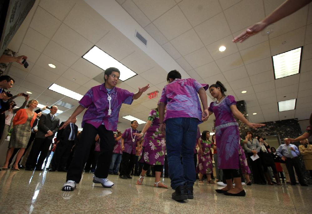 Arkansas Democrat-Gazette/STATON BREIDENTHAL --2/28/13-- Marshallese dancers from the Full Gospel Marshallese Church in Springdale perform Thursday at the Justice Building following a swearing-in ceremony for court interpreters including the first person in the country to be sworn in as a certified Marshallese interpreter.