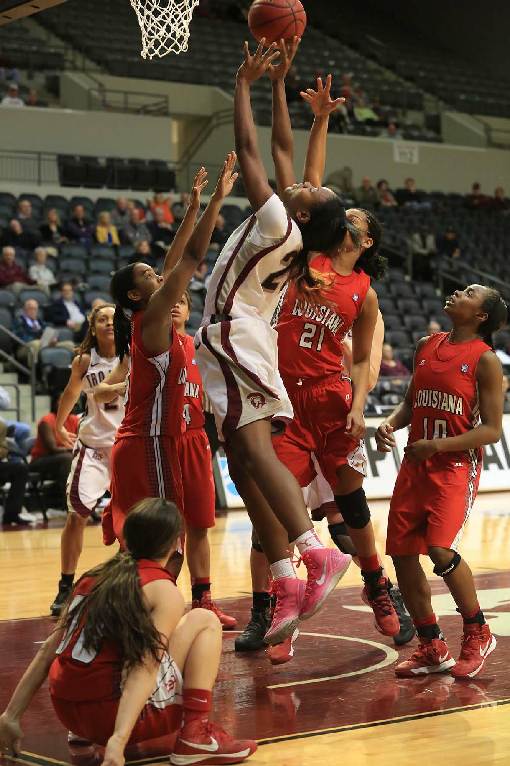 Arkansas Democrat-Gazette/RICK MCFARLAND --02/28/13-- UALR's Shanity James gets higher than Louisianna Lafayette's Jasmin Mills (21) for a rebound in their game at the Jack Stephen's Center in Little Rock Thursday.
