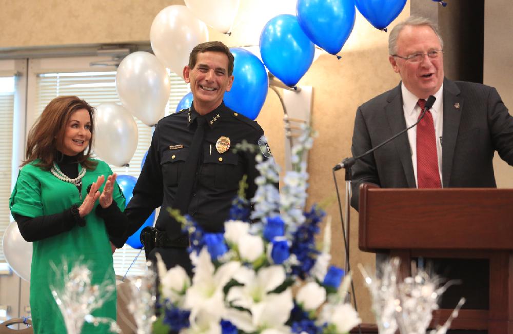 Arkansas Democrat-Gazette/RICK MCFARLAND --02/28/13--  North Little Rock Police Chief Danny Bradley laughs along with his wife Melonie at remarks made by North Little Rock Mayor Joe Smith during an event at the Hays Center Thursday to honor Bradley who is retiring effective Mar. 1. Bradley will now become the chief of staff for the mayor.