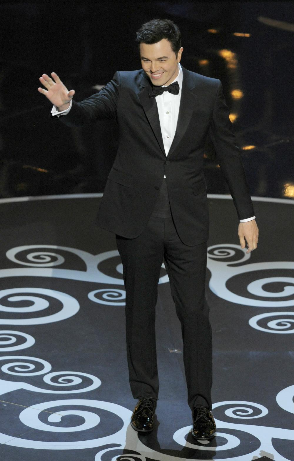 Host Seth MacFarlane speaks onstage during the Oscars at the Dolby Theatre on Sunday Feb. 24, 2013, in Los Angeles.  (Photo by Chris Pizzello/Invision/AP)