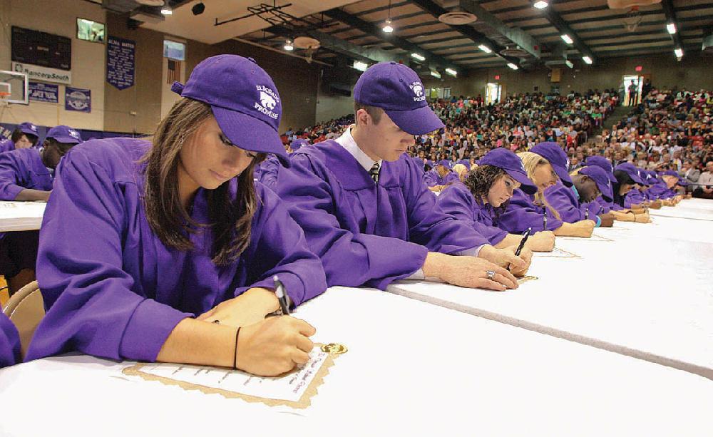 News Times/Michael Orrell

Signing their promise

El Dorado High School senior, Hollis Anthony, signs her academic letter-of-intent to go to college along with over 260 classmates during the EHS graduating class of 2011 Academic Signing Day assembly held at the school gym on Thursday.