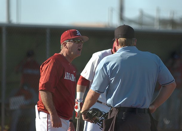 Arkansas coach Dave Van Horn argues a call with the home plate umpire during the second inning of Friday's 3-0 loss to Gonzaga in Surprise, Ariz. 