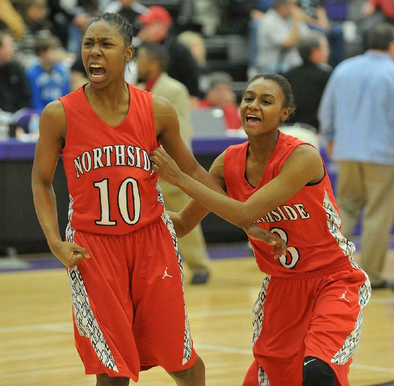 NWA Media/MICHAEL WOODS  --03/02/2013--  Fort Smith Northside's Brianna Jackson (left) and Hailey Bunch celebrate after beating North Little Rock in the semi finals of the girls 7A basketball tournament at Fayetteville High School Saturday afternoon.