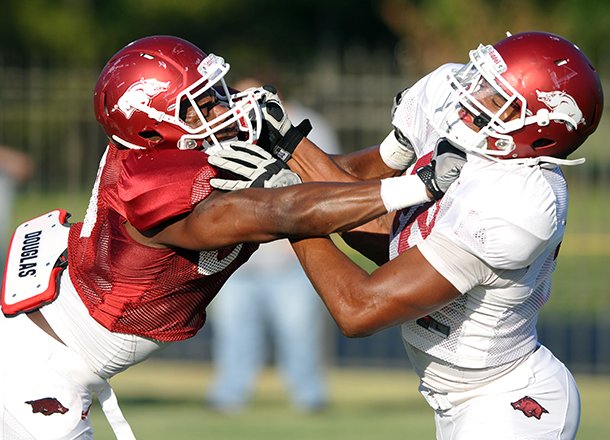 Arkansas redshirt freshman defensive end Deatrich Wise Jr. (right) was a high school teammate of Razorbacks recruit Jamal Adams. 