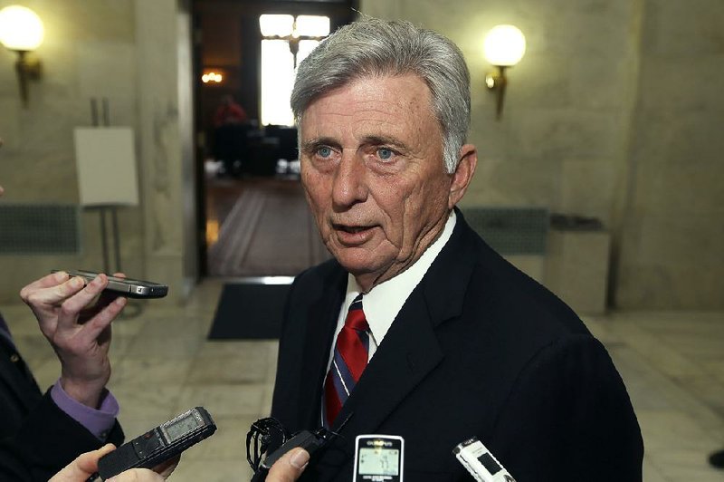 Gov. Mike Beebe answers reporters’ questions at the Capitol on Monday, shortly after he vetoed legislation outlawing most abortions after 12 weeks’ gestation. 