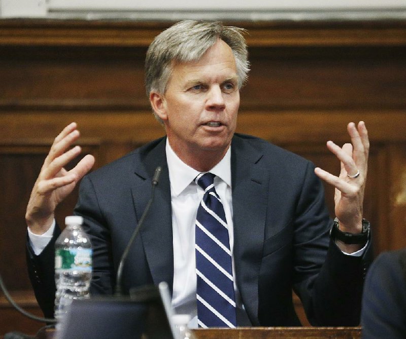 J.C. Penney Chief Executive Officer Ron Johnson testifies Friday at the state Supreme Court in New York. The retailer is in a legal battle with rival Macy’s Inc. over a partnership with Martha Stewart. 