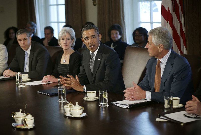 President Barack Obama convened the first Cabinet meeting of his second term Monday at the White House and discussed the next steps in the battle over the U.S. budeget. From left are Education Secretary Arne Duncan, Health and Human Services Secretary Kathleen Sebelius, the president and Defense Secretary Chuck Hagel. 