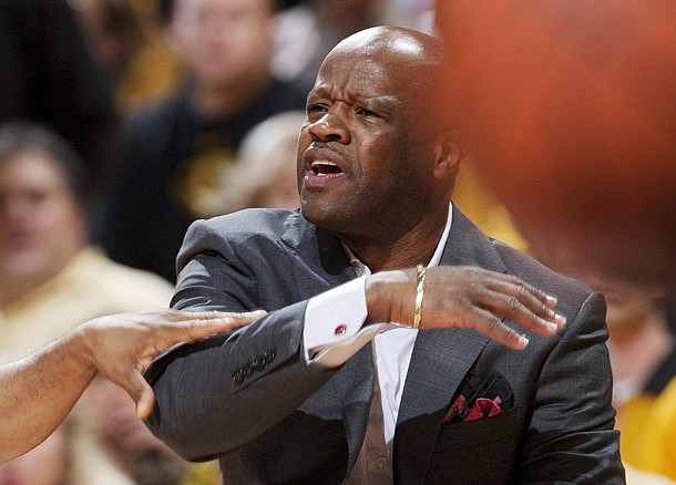 Arkansas head coach Mike Anderson argues a call during the first half of an NCAA college basketball game against Missouri Tuesday, March 5, 2013, in Columbia, Mo. The game is the first in Mizzou Arena since his departure from the university. (AP Photo/L.G. Patterson)