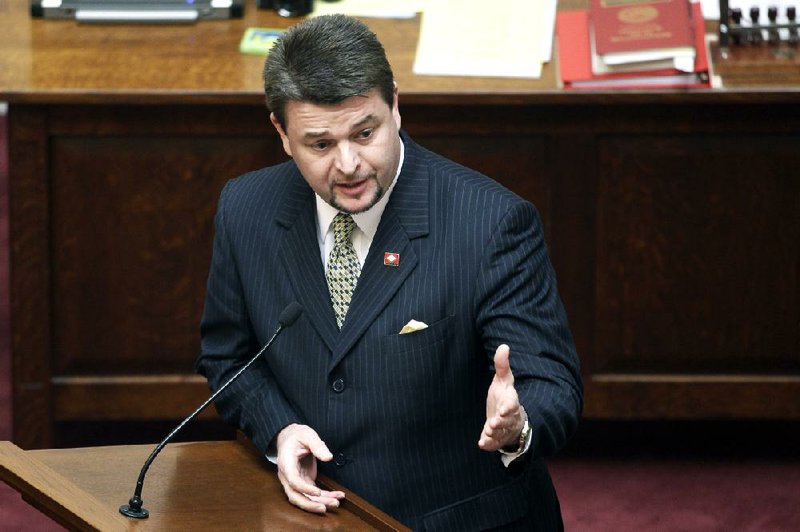Sen. Jason Rapert, R-Conway, speaks in the senate chamber at the Arkansas state Capitol in Little Rock, Ark., Tuesday, March 5, 2013. The Arkansas Senate voted Tuesday to override Gov. Mike Beebe’s veto of Rapert's legislation that would ban most abortions from the 12th week of pregnancy onward and would give the state the most restrictive abortion laws in the country. (AP Photo/Danny Johnston)