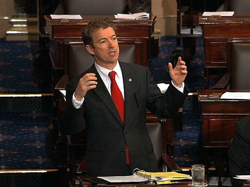 This video frame grab provided by Senate Television shows Sen. Rand Paul, R-Ky. speaking on the floor of the Senate on Capitol Hill in Washington, Wednesday, March 6, 2013. Senate Democrats pushed Wednesday for speedy confirmation of John Brennan's nomination to be CIA director but ran into a snag after a Paul began a lengthy speech over the legality of potential drone strikes on U.S. soil. But Paul stalled the chamber to start what he called a filibuster of Brennan's nomination. Paul's remarks were centered on what he said was the Obama administration's refusal to rule out the possibility of drone strikes inside the United States against American citizens.  (AP Photo/Senate Television)