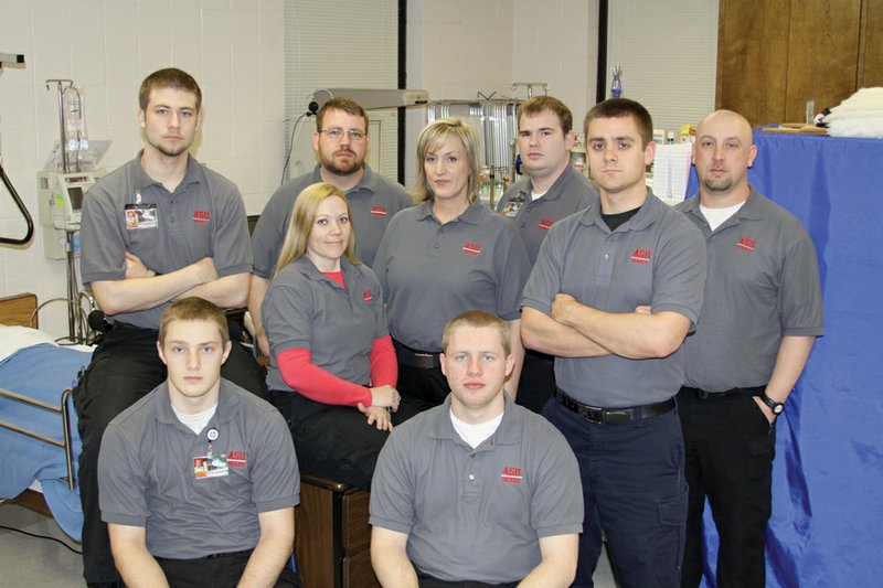 Students in the EMT-Paramedic program at Arkansas State University-Searcy are, front row, from the left, Troupe Bryant and Colin Schorgl; middle row, from the left, Tabitha Hendrickson, Deb Wilson and Joe Potts; and back row, from the left, Kyle Myers, Charles Simmons, Justin Allen and Bryan Stallings.