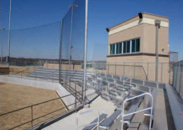 The baseball field press box and bleachers are matched by similar facilities in the adjacent softball field. 