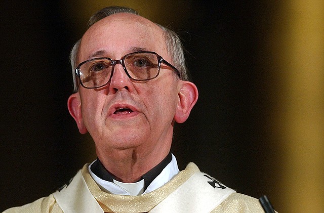 This April 4, 2005 file photo shows Argentine Cardinal Jorge Mario Bergoglio, celebrating a Mass in honor of Pope John Paul II at the Buenos Aires Cathedral in Buenos Aires, Argentina. Bergoglio, who took the name of Pope Francis, was elected on Wednesday, March 13, 2013 the 266th pontiff of the Roman Catholic Church.