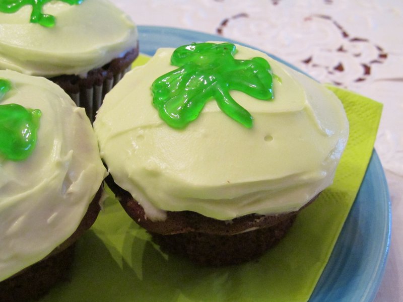 Chocolate Guiness Cupcakes use the rich flavor of dark Irish beer to enrich the flavor of chocolate cake. Tint the frosting and decorate with a shamrock for a showy presentation.