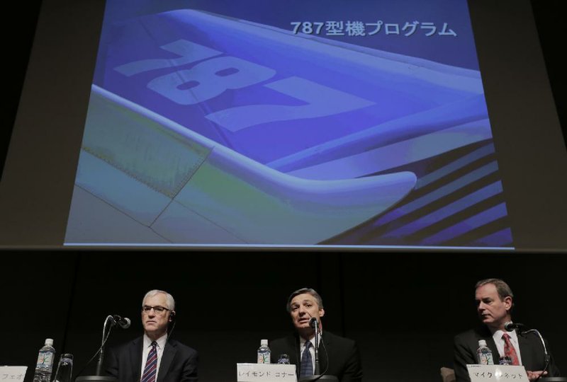 Boeing Commercial Airplanes President and Chief Executive Officer Ray Conner (center) speaks Friday as Boeing Japan President George Maffeo (left) and Boeing Commercial Airplanes Vice President and Chief Project Engineer Mike Sinnett listen during a news conference in Tokyo. 