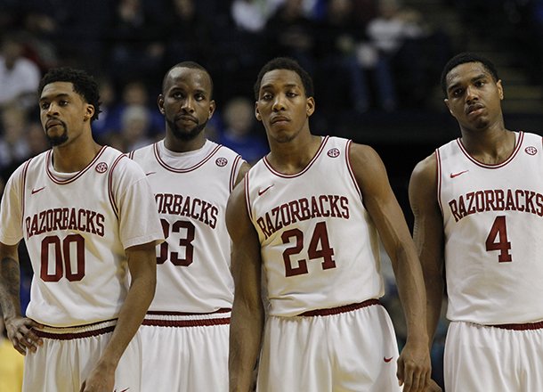Arkansas's Rashad Madden, Marshawn Powell, Michael Qualls and Coty Clarke react after losing to Vanderbilt during their Southeastern Conference tournament game in Nashville Thursday.