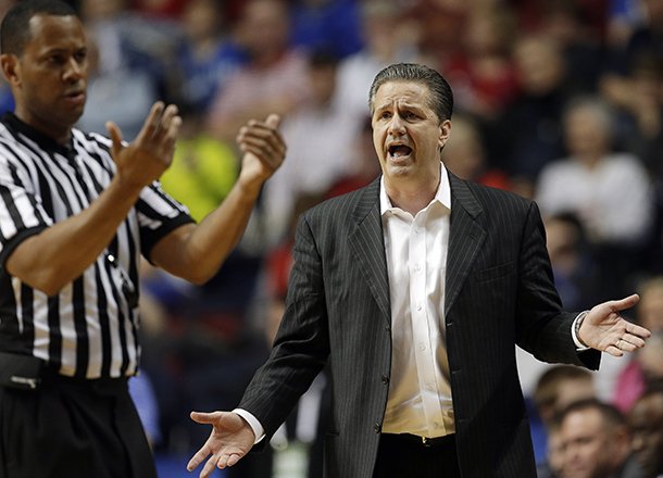 Kentucky head coach John Calipari reacts to a call during the first half of an NCAA college basketball game against the Vanderbilt at the Southeastern Conference tournament, Friday, March 15, 2013, in Nashville, Tenn. (AP Photo/Dave Martin)