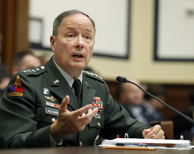 Gen. Keith Alexander, chief of the U.S. Cyber Command, testifies before Congress in 2010. Alexander told the Senate Armed Services Committee last week that while foreign governments are deterred from launching major attacks on computer infrastructure, the federal government and the private sector must do more to improve digital defenses. 