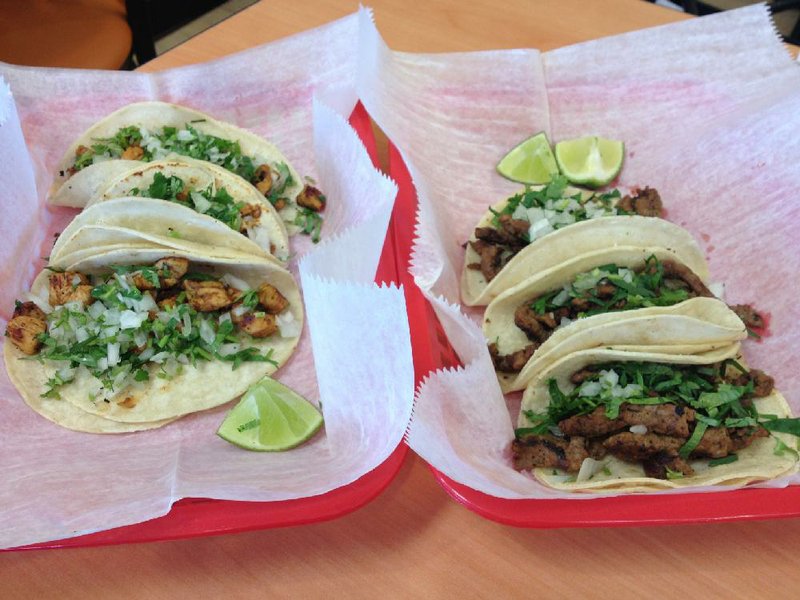  Rocky's Street Tacos with grilled chicken (left) and carne asada at Rock'n Tacos in Little Rock.
