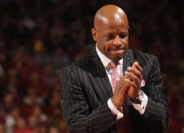 Arkansas coach Mike Anderson applauds during the second half of play against Kentucky Saturday, March 2, 2013, in Bud Walton Arena in Fayetteville.