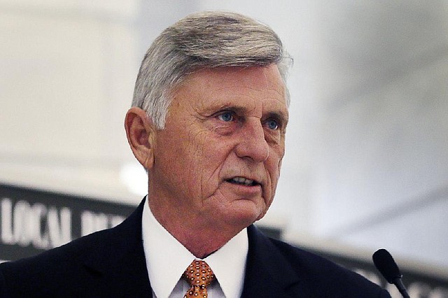 The Arkansas Senate overrode Gov. Mike Beebe's veto of Senate Bill 2 on Wednesday afternoon. The bill would require voters to show identification at polling stations. In this file photo, Arkansas Gov. Mike Beebe speaks at the state Capitol in Little Rock on Monday. Beebe vetoed a bill requiring voters to show photo identification at polls. 