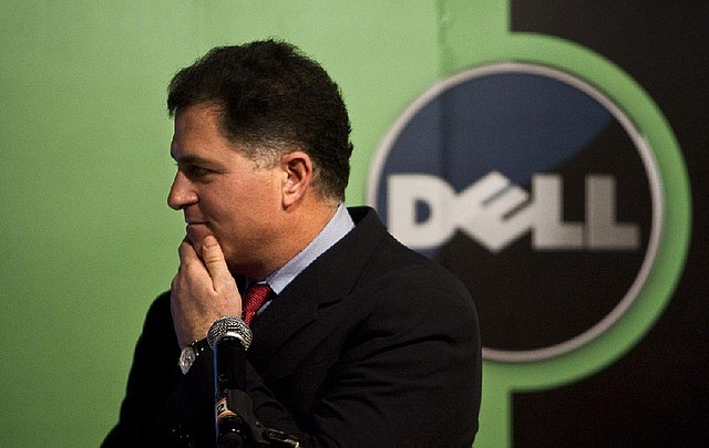 Michael Dell, chairman and chief executive officer of Dell Inc., reacts to a question at a news conference in Beijing in 2009. 