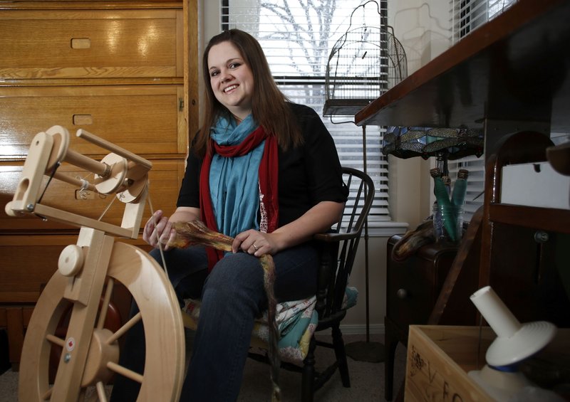 Erin Jepson in her favorite personal space the spare bedroom where she spins yarn in her Fayetteville home.