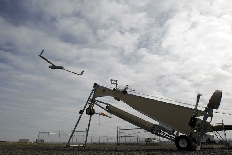 An Insitu ScanEagle takes to the air in Arlington, Ore. Drone manufacturers are looking to counter a backlash against domestic use of drones as federal and state governments debate privacy concerns. 