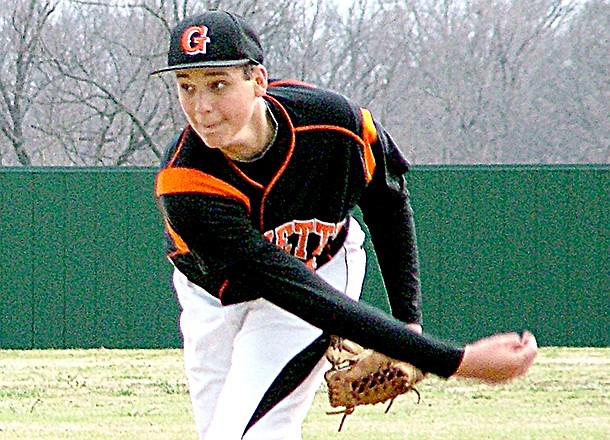 Gravette's Ethan Vanderpool throws a pitch against Ozark in play on Monday, April 1, 2013, at Gravette's new baseball complex.