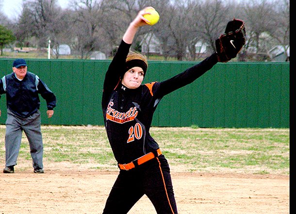 Gravette pitcher Lindsee LaBrecque winds up to throw a pitch against Ozark in play at Gravette on Monday, April 1, 2013.