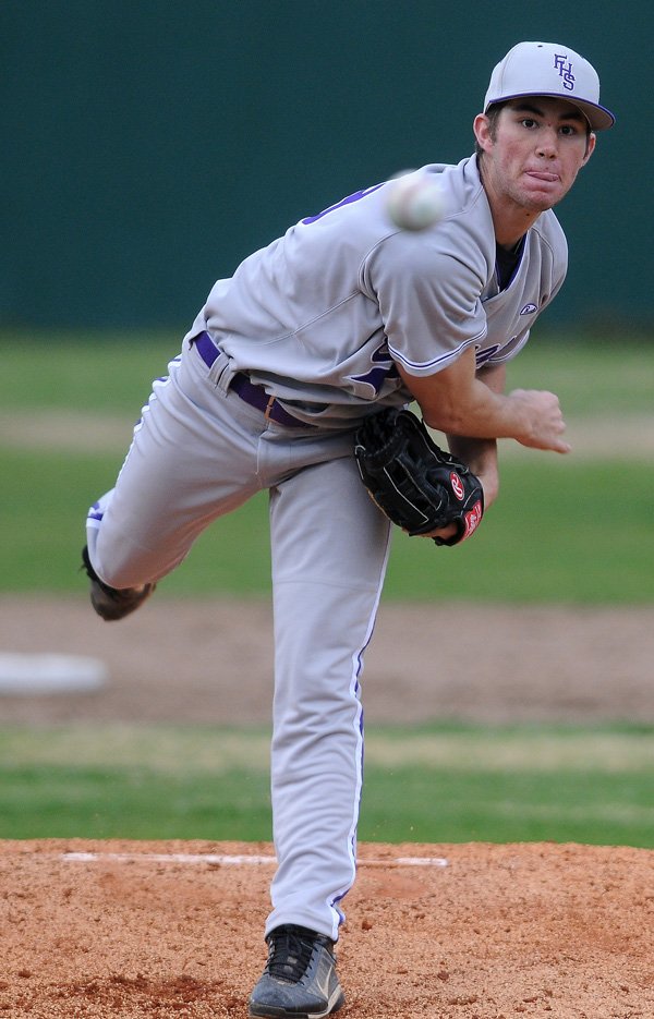 Andy Pagnozzi of Fayetteville pitches against Springdale Har-Ber on Monday at Bulldog Stadium in Fayetteville. The game, originally scheduled for today, was pushed up because of the threat of inclement weather. 