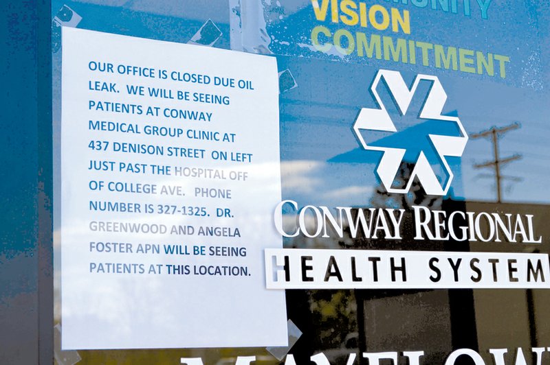 A notice placed on the Mayflower Medical Clinic door Friday let patients know that offices were being temporarily moved to the Conway Medical Clinic because of fumes from the crude-oil spill in Mayflower.