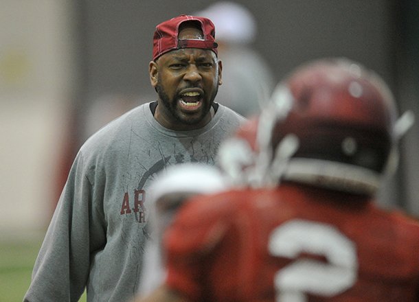 Arkansas has made a strong push to recruit Ohio under Coach Bret Bielema, and the Hogs are taking advantage of the connections of cornerbacks coach Taver Johnson, shown, and graduate assistant Nick Caley, who are from Cincinnati and Canton, Ohio, respectively. 