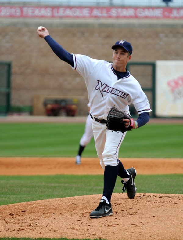 Jason Adam, Northwest Arkansas Naturals pitcher, during practice Monday at Arvest Ballpark in Springdale. Adam will make his Class Double-A debut on Friday night for the Naturals against the Midland RockHounds. 