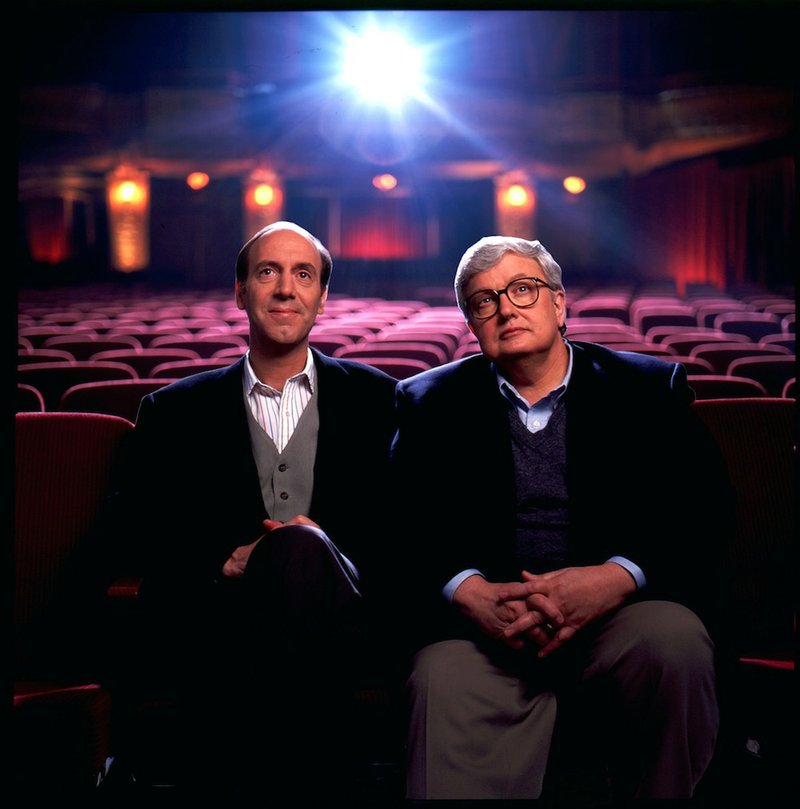FILE - This undated file photo originally released by Disney-ABC Domestic Television, shows movie critics Roger Ebert, right, and Gene Siskel. Roger Ebert died on Thursday, April 4, 2013. He was 70. Ebert and Siskel, who died in 1999, trademarked the "two thumbs up" phrase. 