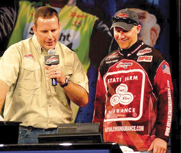 Steven Meador (right) of Bella Vista has earned $21,531 fishing as a co-angler in Walmart FLW Tour events.