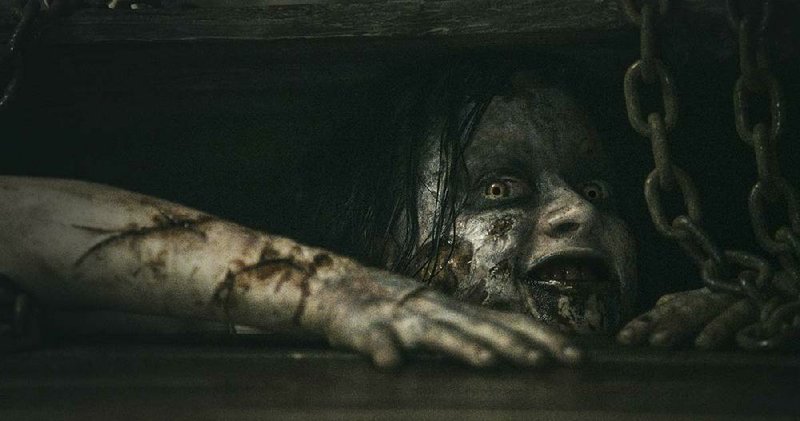 Mia (Jane Levy) is frightening! Ooooh, scary scary. Bad things happen in Fede Alvarez’s Evil Dead remake. 