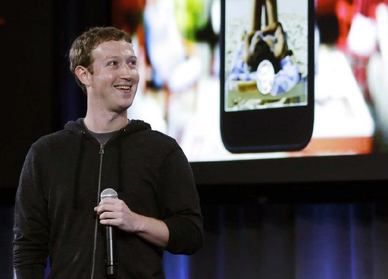 Mark Zuckerberg, Facebook’s chief executive officer, speaks Thursday about the company’s new smart-phone software at a news conference at Facebook headquarters in Menlo Park, Calif. 