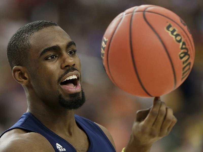 Michigan’s Tim Hardaway Jr. (above) and Glenn Robinson III have famous basketball fathers, but both are being recognized for their own accomplishments heading into the Final Four, which begins today in Atlanta. 