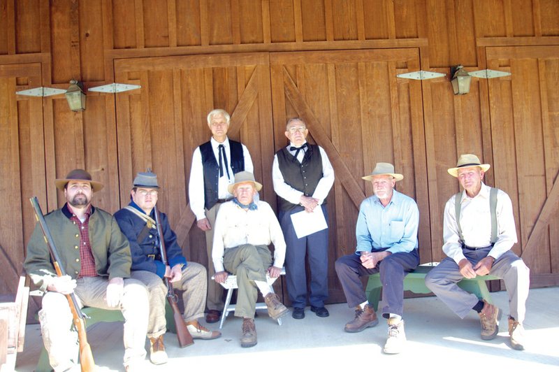 Shown, from the left, are Scott Thompson, David Sesser, Bob Biehunko, Bob Butler, Bob Shuler, Jim Ford and Virles Wasson, all of whom took part in a program that described life in Clark County during the Civil War.