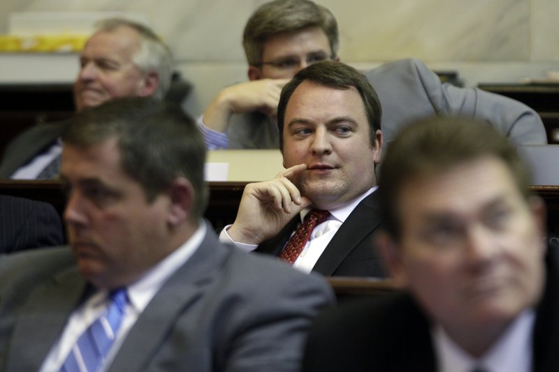 Rep. John Burris, R-Harrison, center, watches the vote total in the House chamber at the Arkansas state Capitol in Little Rock, Ark., Thursday, April 11, 2013, on a proposal for Arkansas to use federal Medicaid money to purchase health care coverage for low-income residents. The bill, backed by Burris, passed Thursday.