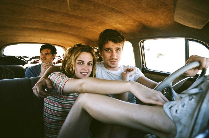 With Sal Paradise (Sam Riley) in the backseat of their voluminous Hudson Hornet, Marylou (Kristen Stewart) and Dean Moriarty (Garrett Hedlund) light out for the territory in Walter Salles’ On the Road. 