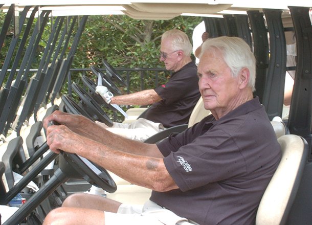 Former Arkansas Athletic Director Frank Broyles (left) and Pat Summerall prepare to head out for the start of the 2008 Pat Summerall Celebrity Classic at Chenal Country Club in Little Rock.
