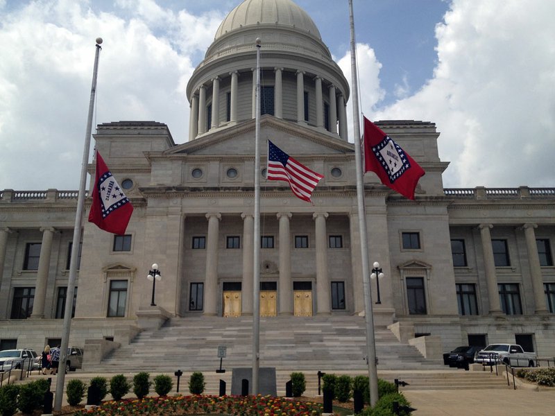 Flags fly at half-staff Tuesday, April 16, 2013, at the Arkansas Capitol after President Barack Obama issued a proclamation as a mark of respect for the victims of the Boston Marathon attacks Monday, April 15, 2013.
Arkansas state flags will also fly at half-staff until sunset Saturday.