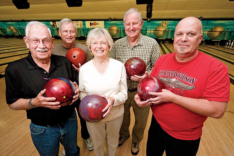 From the left, Leon Gray, Paul Hadfield, Bonnie Noggle, Jerry Noggle and Jay Woods are a few of the bowlers that are part of the U.S. Army Corps of Engineers Little Rock Bowling League that formed in 1938.